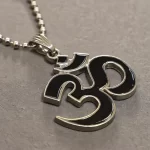 Black and Silver Om Pendant macro close-up