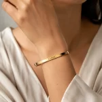Gold Plated Personalized Engraved Name Kada on female wrist – personalized jewellery