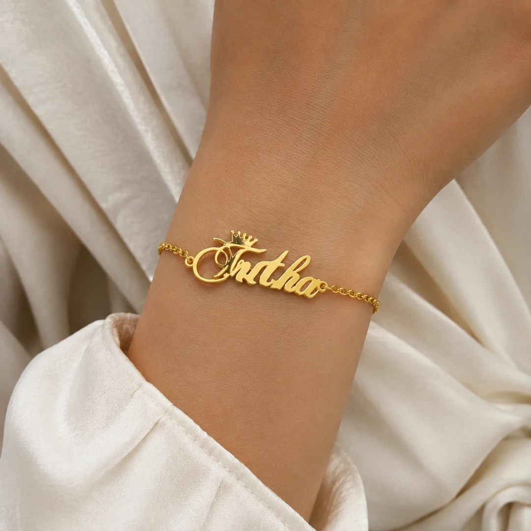 Crown Name Bracelet on female wrist – personalized jewellery