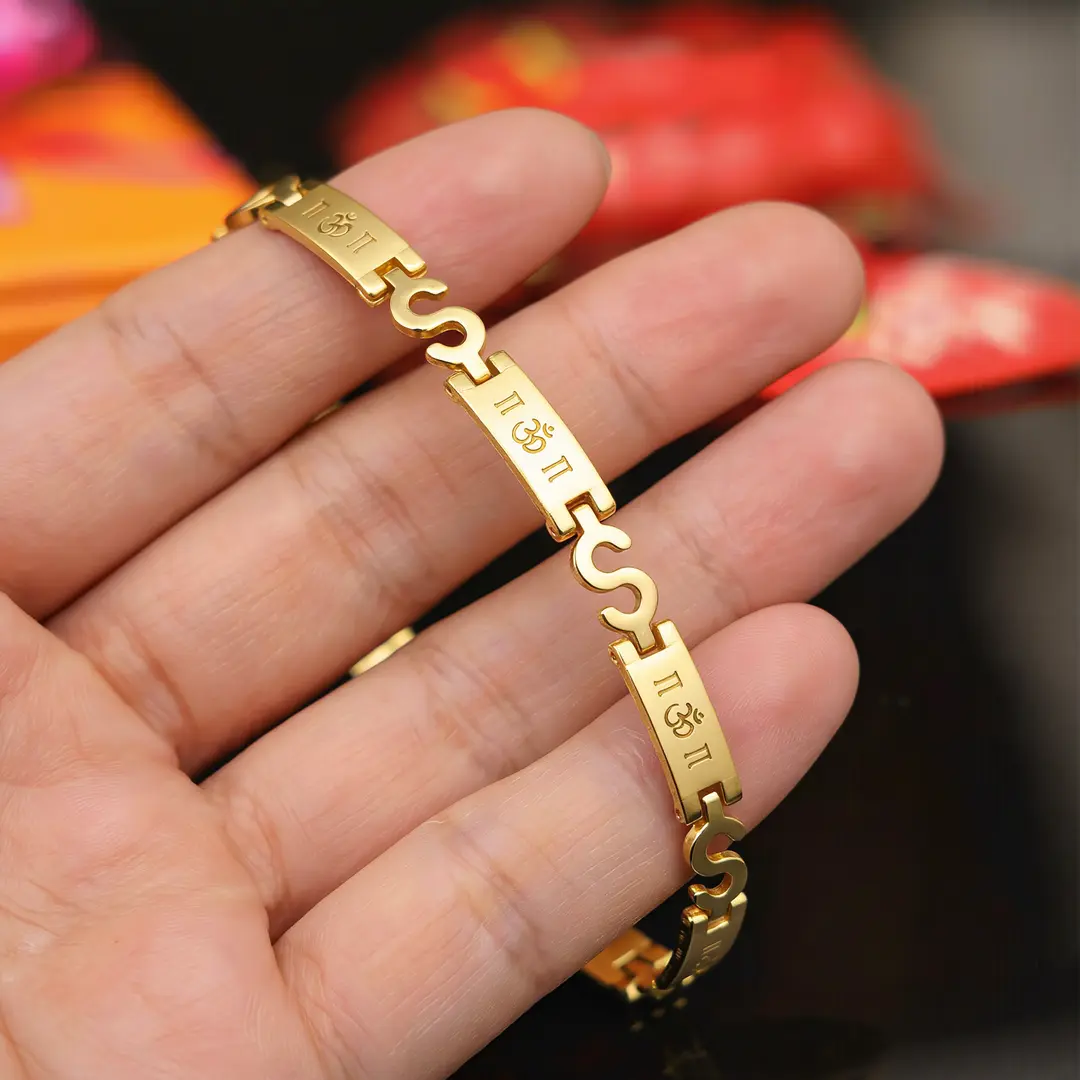 Golden Om Bracelet hand-held detail view