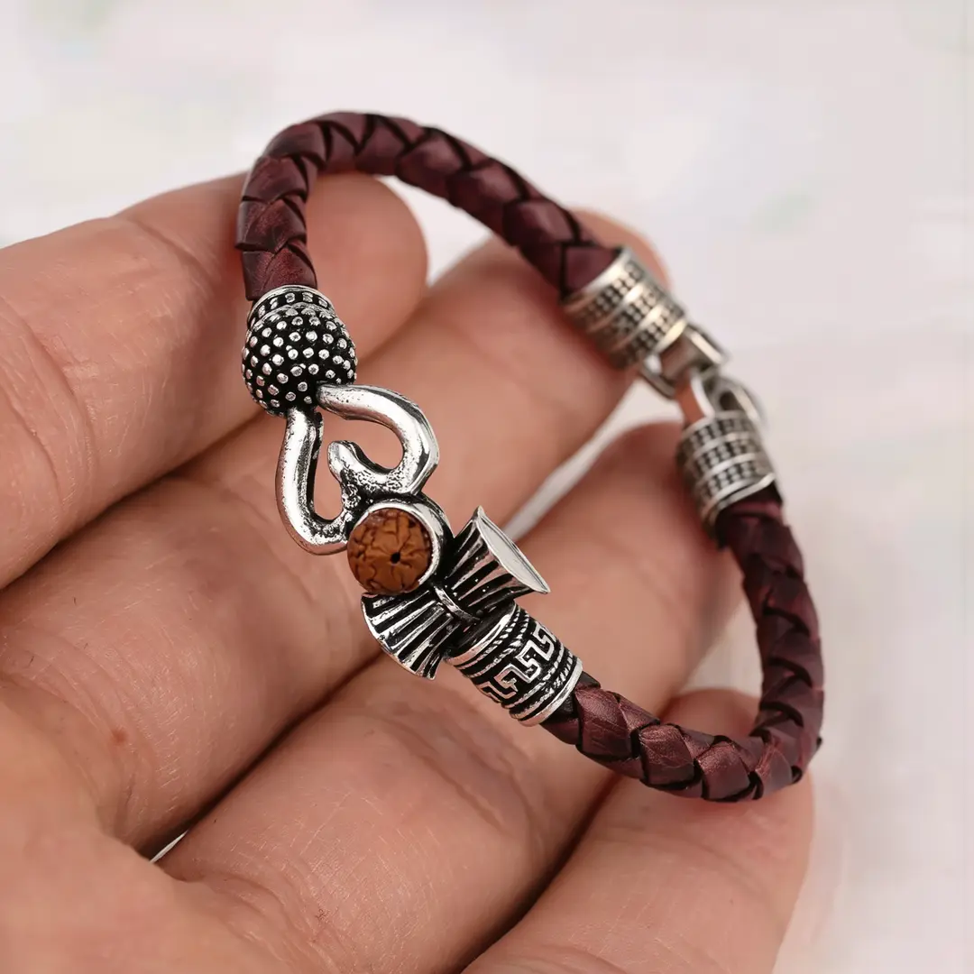 Lord Shiva Mahakal Leather Bracelet held in hand close-up
