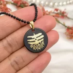 Mahakal Locket with Chain Black Gold Metal Necklace hand-held detail view