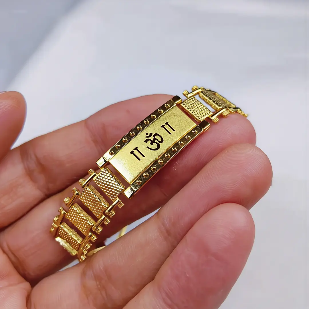 Om Bracelet Kada for Men held in hand close-up