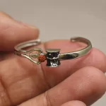 Silver OM Designer Cuff Kada hand-held detail view