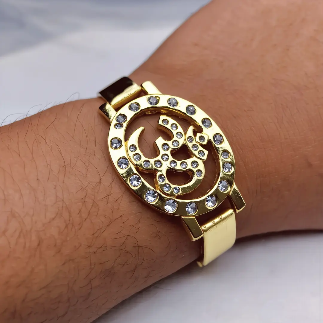 Om Gold Plated Beaded Bracelet worn on a men's wrist