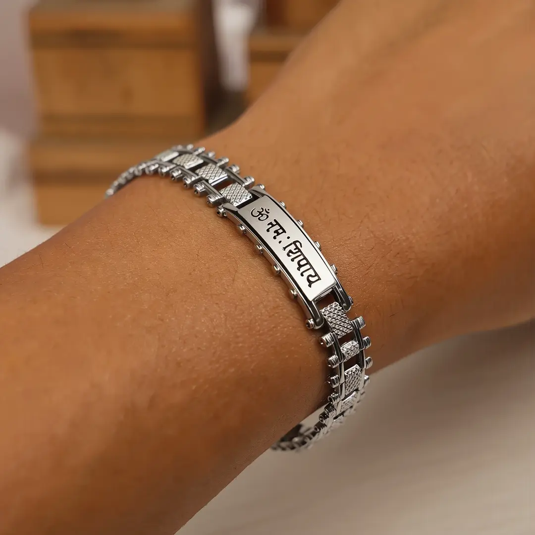 Stainless Steel Om Namah Shivay Bracelet worn on a men's wrist