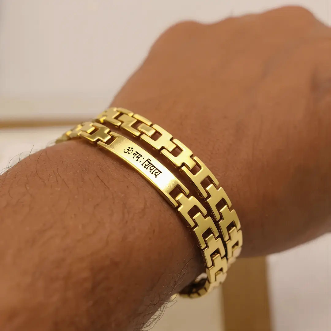 Om Namah Shivay Gold Bracelet worn on a men's wrist