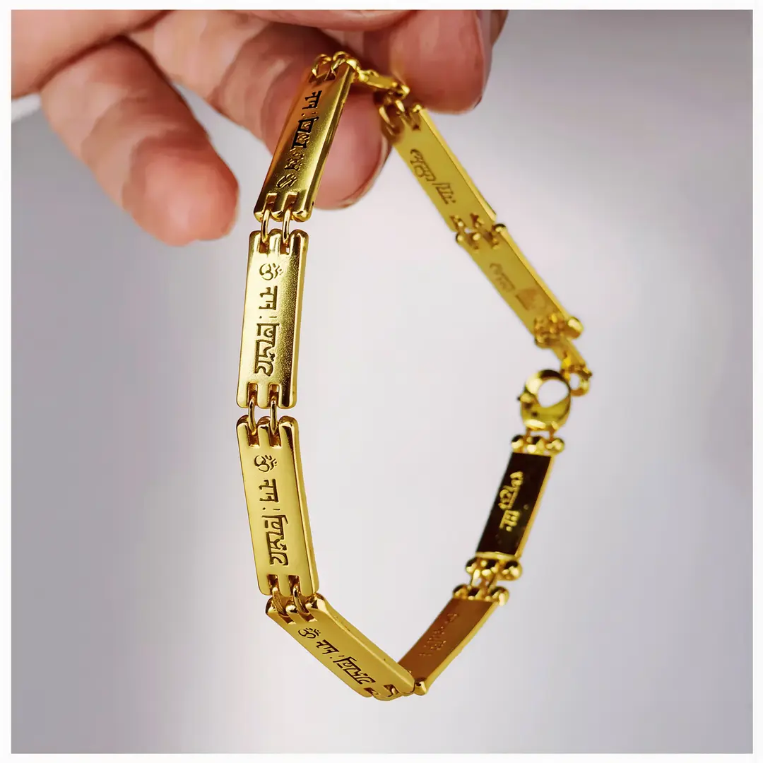 Om Namah Shivay Gold Plated Bracelet hand-held full-product view Om Namah Shivay Gold Plated Bracelet hand-held full-product view