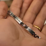 Om Namah Shivay Silver Bracelet hand-held detail view