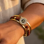 Om Sun Cuff Kada Bracelet with Rudraksh and Crystal for Men worn on a men's wrist