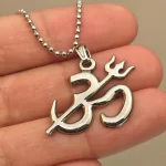 Om Trishul Pendant hand-held detail view