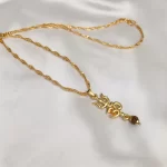 Om Trishul Pendant Locket with Gold Plated Chain clean studio view