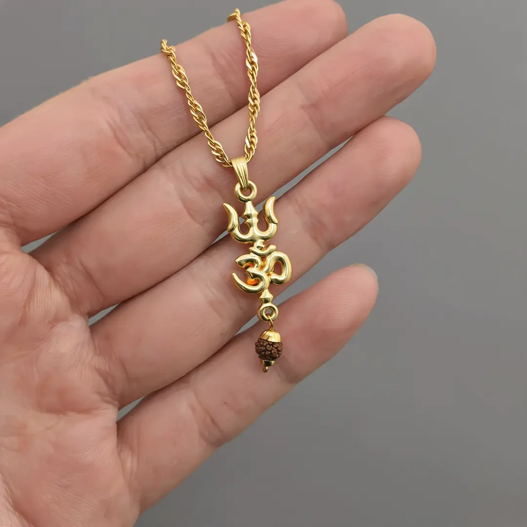Om Trishul Pendant Locket with Gold Plated Chain hand-held detail view