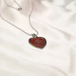 Red Om Heart Pendant clean studio view