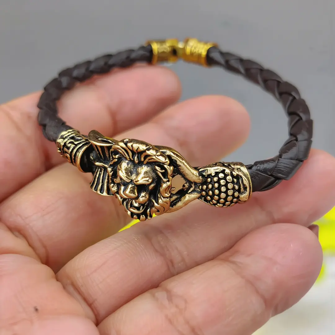 Rose Gold Plated Simba Rudraksh Trishul Leather Bracelet hand-held detail view