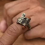 Shiv Rudraksha Rose Gold Plated Ring worn on a men's finger