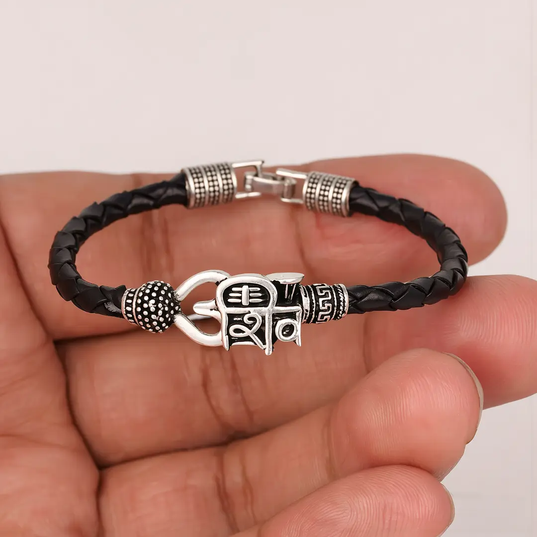 Shiv Rudraksha Trishul Kada held in hand close-up