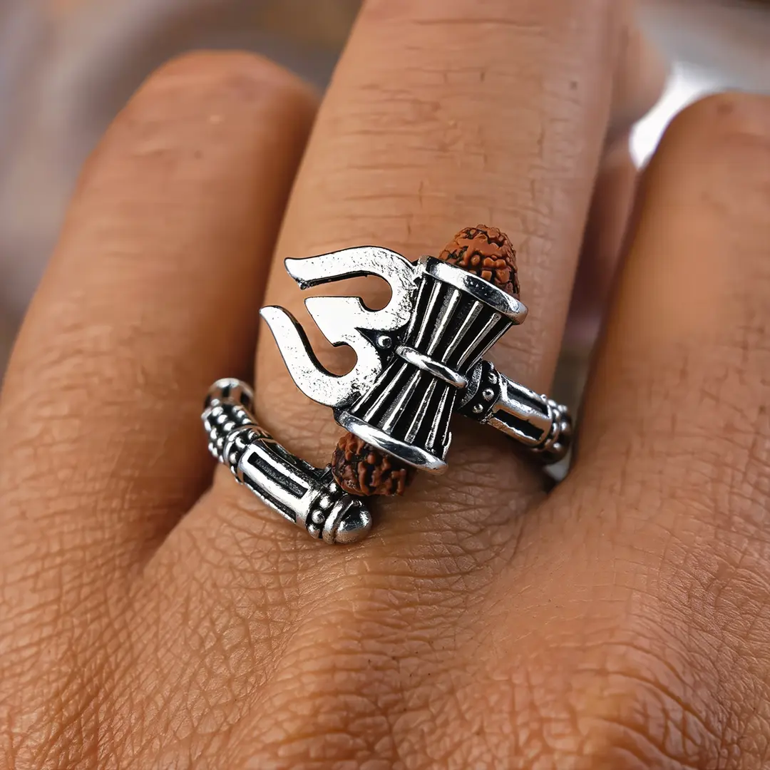 Shiva Mahakal Trishul Damroo Ring held in hand close-up