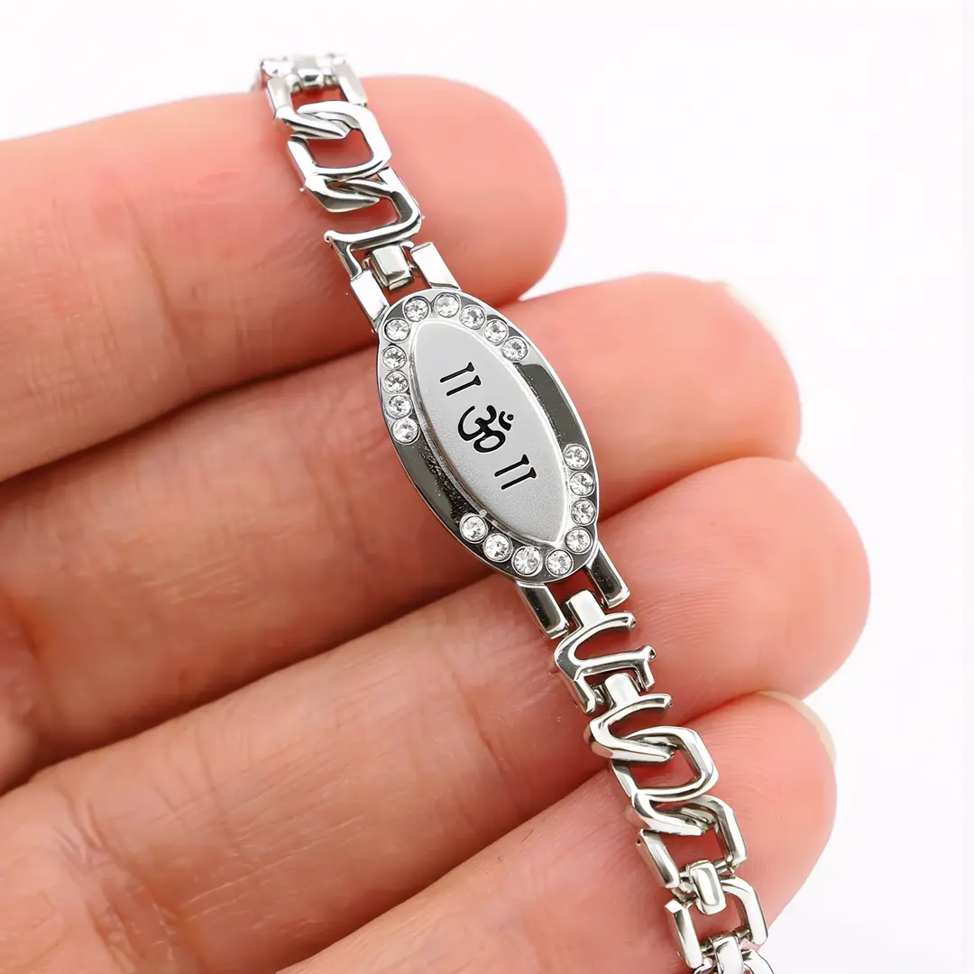Silver Om Charming Diamond Bracelet hand-held detail view Silver Om Charming Diamond Bracelet hand-held detail view