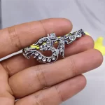Silver Plated Om Diamond Bracelet held in hand close-up
