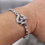 Silver Plated Om Diamond Bracelet worn on a men's wrist