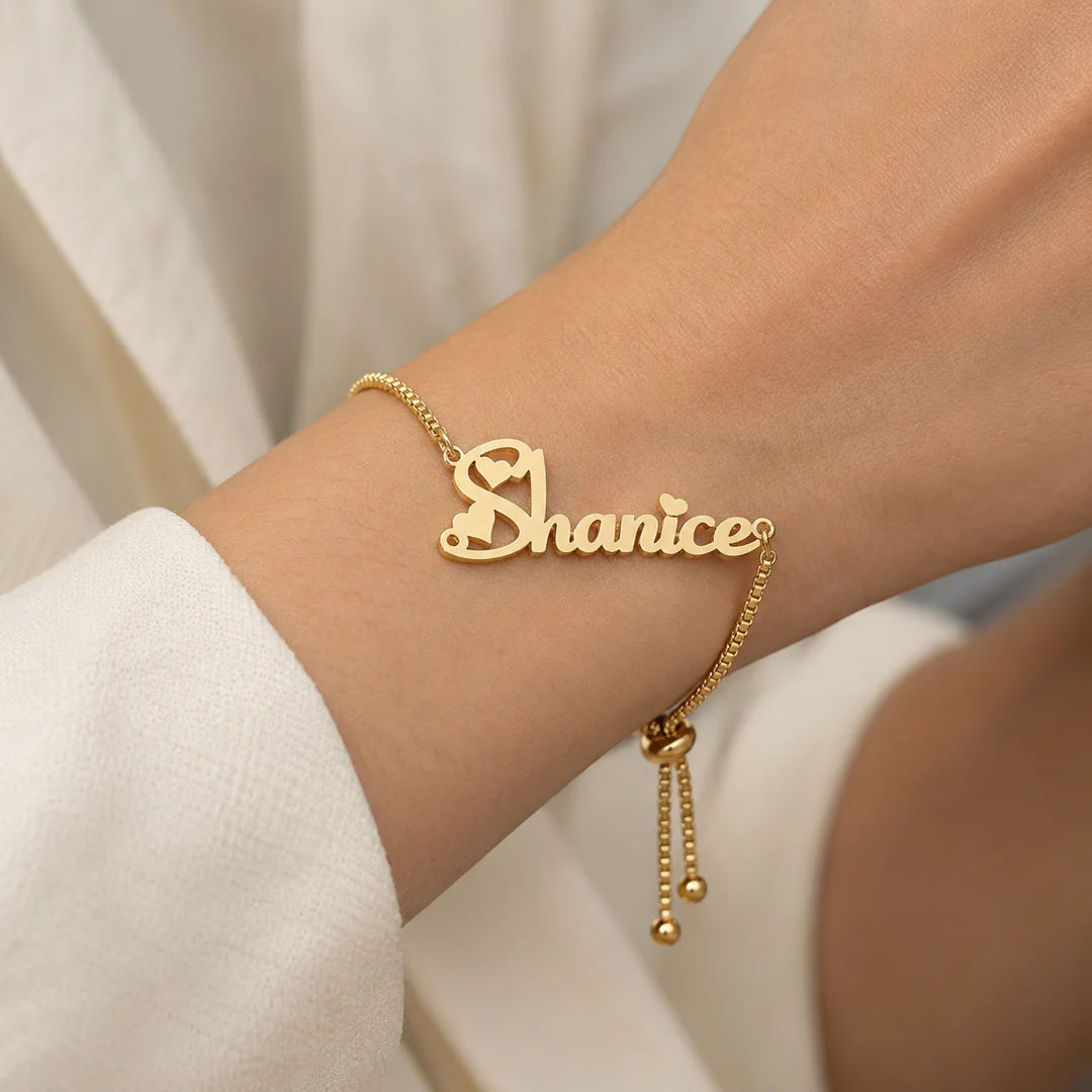 Small Heart Design Name Bracelet – Female Wrist Small Heart Design Name Bracelet on female wrist – personalized jewellery
