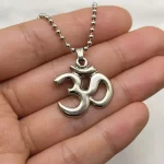 Antique Finish Om Pendant with Chain hand-held detail view