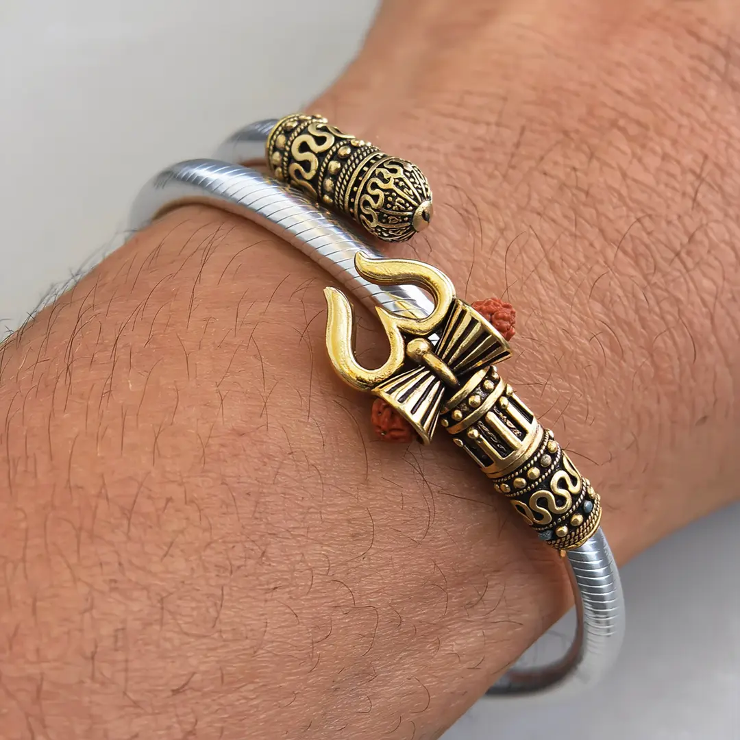 Trendy One Sided Trishul Damru OM Rudraksha Beads Gold Plated Kada worn on a men's wrist